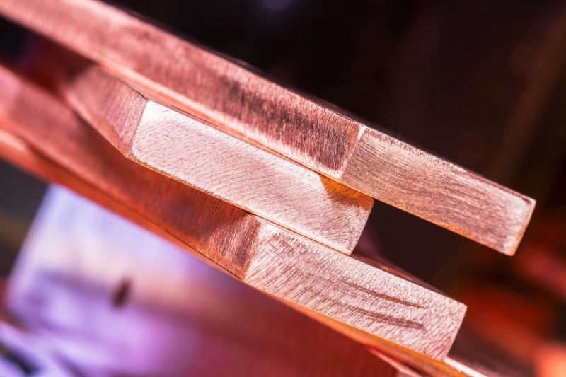<strong>Copper prices were volatile during Q3, swinging to record highs of US$5.81 per pound on the COMEX.</strong>
The movement was fueled by traders importing copper products into the US following President Donald Trump’s tariff announcement on July 8. However, prices fell in early August as the White House clarified its plans. 
Since then, copper has reverted to being driven largely by its usual supply/demand fundamentals.
                            What happened to the copper price in Q3?
Copper prices opened the quarter at US$5.05, but quickly gained strength on the back of tariff fears, rising to US$5.65 on July 8. With little information about specifics, prices continued to rise — as mentioned, COMEX copper hit an all-time high of US$5.81 on July 23, but quickly plummeted to US$4.40 per pound by July 31. 
At the start of August, copper prices saw further declines, reaching a quarterly low of US$4.37 on August 5. From there, prices hovered around the US$4.40 to US$4.50 range for the rest of the month and into September.
<em>Copper price, July 1 to October 17, 2025. </em>
<em>Chart via TradingEconomics. </em>
At the start of September, copper experienced some upward momentum, but really took off in the middle of the month as supply fundamentals took over. By the end of September, prices were closing back in on US$5. 
Since the end of the quarter, the copper market has continued to gain strength, with prices breaking through US$5 on October 3 and rising to US$5.11 on October 9. 
                            US copper tariffs stoke price volatility                                
The big story to start the quarter was the Trump administration’s copper tariff announcement on July 8.
The news came after months of speculation following the government’s February launch of an investigation into how tariffs could be used to bolster national security under Section 232 of the Trade Expansion Act.
Copper market participants were caught off guard by the timing, as some had expected the tariffs to come later in the year, and at a lower rate than the announced 50 percent. Traders began importing copper into the US from abroad ahead of the implementation of the tariffs, and the increased volume drove prices for the metal to record highs by the end of the month; it also created a significant disparity between the COMEX and the London Metal Exchange (LME).
<blockquote>“The announcement of a 50 percent tariff on copper imports in early July created extreme volatility in the US copper market, triggering a surge in physical shipments into the country as buyers rushed to get ahead of the duty. This buying drove COMEX futures sharply higher and pushed the US premium over LME prices to an unprecedented 30 percent.’ </blockquote>
White explained that during a copper short squeeze on the COMEX in 2024, copper premiums peaked at 8 percent; he also noted that the five year average for the COMEX-LME disparity is near parity at 0.5 percent. 
Ultimately, copper tariffs were only applied to unrefined copper, as well as semi-finished and copper-intensive derivatives, such as pipe fittings, cables, connectors and electrical components. 
Refined copper tariffs will be phased in at 15 percent in 2027, and 30 percent in 2028. The move essentially pulled the rug out from under traders, causing COMEX prices to plummet by nearly 25 percent. 
White stated that with the tariff situation cleared up, copper prices once again reflected the underlying supply and demand fundamentals of low inventories and high demand resulting from the energy transition.
“These structural forces pushed copper prices internationally higher overall for the quarter, despite the mid-summer volatility. The tariff episode reinforced copper’s strategic importance and highlighted the fragility of global supply chains, factors that may strengthen the case for higher prices going forward,” he said.
                            Copper faces supply-side disruptions                                
According to the International Copper Study Group’s copper market forecast, released on October 7, refined copper is expected to record a 178,000 metric ton surplus in 2025, significantly lower than the 209,000 metric ton surplus predicted in April. However, the group expects a 150,000 metric ton deficit in 2026.
The reason for the group’s downward revision is supply disruptions at Ivanhoe Mines’ (TSX:IVN,OTCQX:IVPAF) Kamoa-Kakula operation in the Democratic Republic of Congo, and at Freeport-McMoRan’s (NYSE:FCX) Grasberg mine in Indonesia. The assets are two of the world’s largest copper mines.
Kamoa-Kakula was temporarily shut down in May following a seismic event at the mine. While some operations began to ramp up again in June, Ivanhoe has revised its midpoint guidance down to 395,000 metric tons for 2025 after initially expecting 550,000 metric tons; it has also withdrawn the 600,000 metric tons expected in 2026.
At Grasberg, a liquid material ingress in early September killed seven workers and forced the suspension of operations. In a release on September 24, Freeport said consolidated copper sales across its operations will decline by 4 percent during Q3, but was unable to provide estimates for the fourth quarter. 
The Grasberg site encompasses several underground mines: the Grasberg block cave, the Deep Mill Level Zone (DMLZ) and Big Gossan. DMLZ and Big Gossan were not affected, and could restart production in the fourth quarter.
However, according to Freeport, a preliminary assessment indicates a delayed restart of operations at the Grasberg block cave, resulting in the deferral of significant production in the near term. A ramp up in this area is not anticipated to begin until the first half of 2026, with the mine potentially returning to full production in 2027.
“This single event has pushed 2025 mine disruptions to 6 percent of global supply, above the historical average of 5 percent, and turned a near-balanced market into a clear deficit,’ White said.
‘With inventories already at multi-year lows and scrap unable to fully bridge the gap, the supply side offers little cushion. This tightening dynamic suggests higher prices may be necessary to incentivize new projects.’ 
                            Copper price forecast for 2025                                
Although some headwinds remain, primarily stemming from a worsening trade standoff between the US and China, copper’s future is likely tied to its fundamental supply and demand dynamics.
With little new supply scheduled to come online in the near term, this should signal more support for pricing as demand continues to grow from the energy transition and key sectors, such as artificial intelligence and data centers. 
“On the demand side, copper’s growth drivers remain firmly in place. Electrification, grid modernization, artificial intelligence and data center buildouts and defense spending continue accelerating, making copper less tied to broad GDP growth and more linked to strategic sectors. These trends, combined with a deepening supply deficit, reinforce the structural bull case for copper,” White explained. He also suggested that any further disruptions will only add tailwinds to the copper price, benefiting producers and investors alike.
<strong><strong>Securities Disclosure: I, Dean Belder, hold no direct investment interest in any company mentioned in this article.</strong></strong>
This post appeared first on investingnews.com Copper Price Update: Q3 2025 in Review